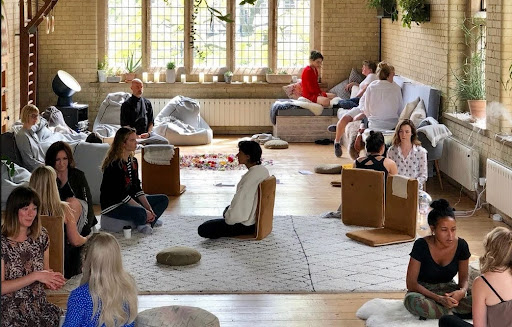 Group classroom space at Root & Bloom Institute prepared for workshops and somatic training.